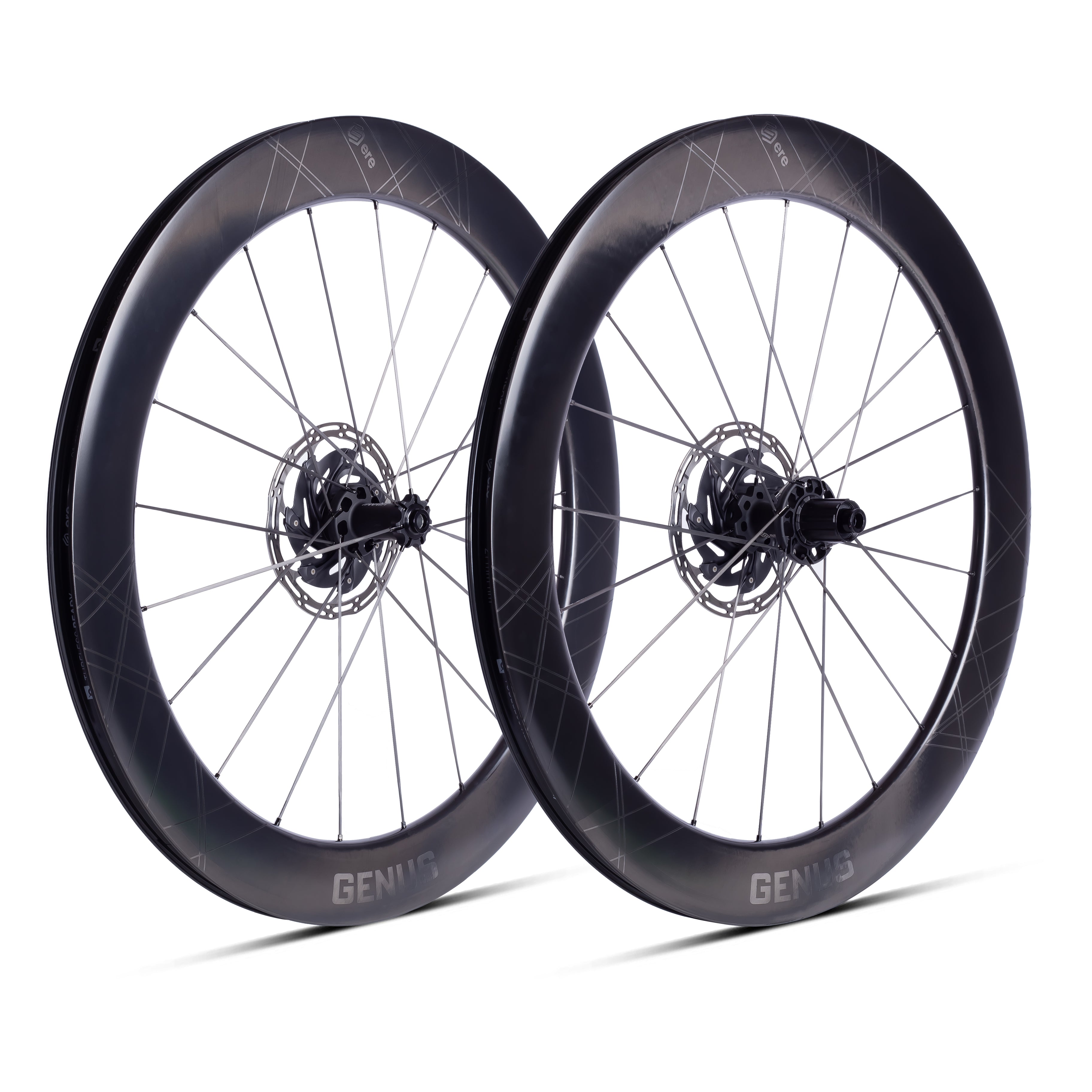 Two black bicycle wheels with 'GENUS' branding on a white background